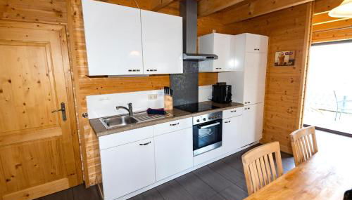 5 Sterne Ferienhaus Tommy mit Kamin, Seeblick und großer Terrasse - Foto 5