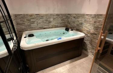 Suite 110 Jacuzzi et Sauna privatisé avec suite - Foto 13