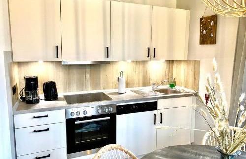 Nessmersiel, Renovierte Erdgeschosswohnung mit Garten, in Deichnähe, Wallbox, - Foto 5