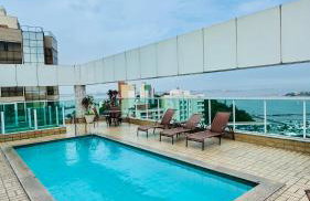 Praia do Canto Apart Hotel - Quarto sala e varanda - Foto 13