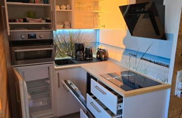 Moderne Wohnung mit Sonnenuntergang über dem Meer - Foto 6