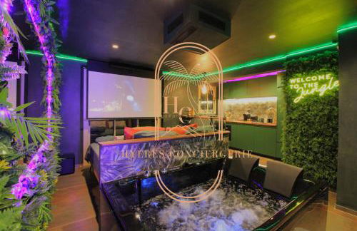 Jungle Love Room Balnéo/cinéma By HC - Foto 10