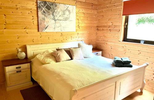 5 Sterne Ferienhaus Tommy mit Kamin, Seeblick und großer Terrasse - Foto 7