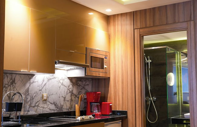 First Suites Hôtel - Photo 16