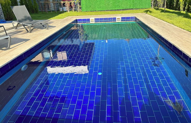 Nirvana Holiday Homes - Foto 37