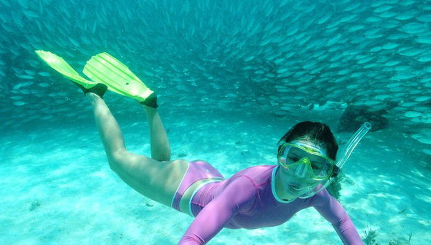 Entdecke eine erstaunliche Welt: Cenote-Erkundung und Dschungelflug. Büffet inklusive - Foto 4, Genießen Sie die Schnorchelaktivität
