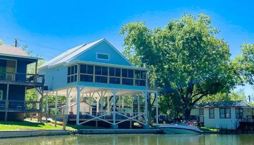 Lakefront Dog-Friendly Home with Kayaks, SUP's, Huge Screened Porch - Photo 1