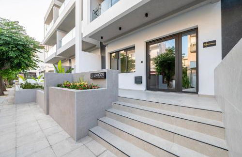 Unicos City Suites - Photo 7