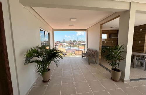 No Atalaia, Fort Poseidon rua do Atalho a 700 metros da praia do Atalaia, apartamento novo decorado, varanda, sala de estar e jantar, 02 suítes, 03 banheiros, lavanderia, cozinha, piscina, churrasqueira, salão de jogos, vista parcial das dunas e mar - Photo 58