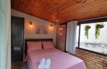 Casa 4 dorms 2 suites - localização perfeita no centrinho e rodeada de natureza - Foto 9