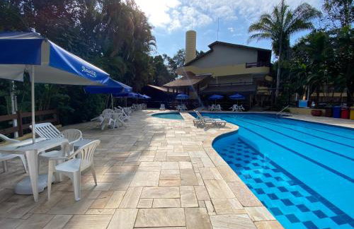 Fabuloso flat 241, Amarílis, Riviera de São Lourenço 3 Piscinas climatizadas carregador veiculo eletrico 2 quartos sendo uma suíte internet 500mb Adega, cozinha equipada completa, serviço de praia fim de semana limpeza trocas de toalhas, - Foto 64