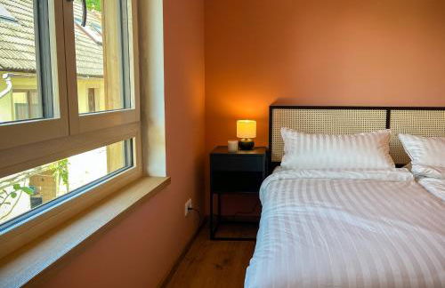 Amber Ferienhain - Ferienhaus 'Magnolie' mit verwunschenem Garten & privater Sauna - Foto 11