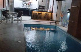 Linda casa com piscina, quiosque e churrasqueira a 150 metros da praia - Foto 4