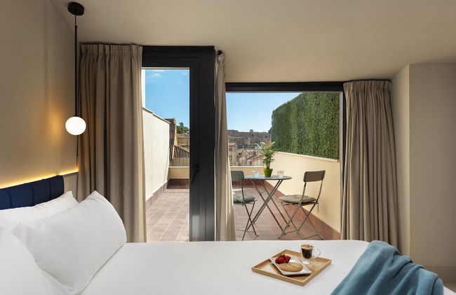 Coeo Peña Design Apartments - Photo 9