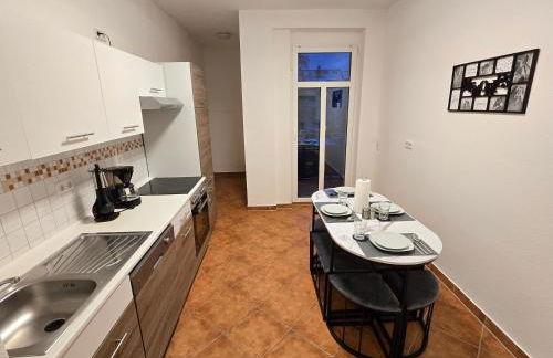 Boardinghouse mit 10 großen Apartments mit Parkplatz und Balkon - Photo 15