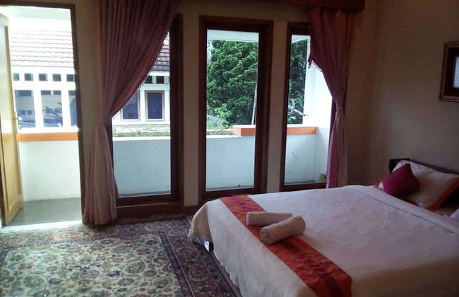 Simply Homy Guesthouse Graha Puspa - Photo 4