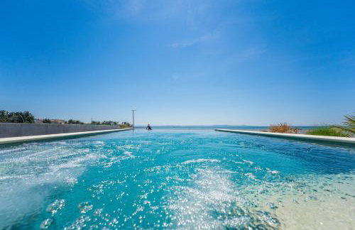 JamC Dream Familientraum direkt am Meer mit beheiztem Pool - Photo 10