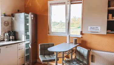 Schöne Wohnung mit großem Garten - Foto 4, minibar