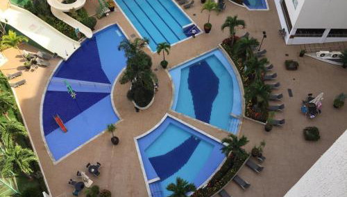 Flat Familiar a 400 metros do Hot Park com Piscinas e Conforto - Foto 3