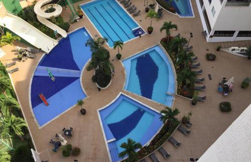 Flat Familiar a 400 metros do Hot Park com Piscinas e Conforto - Foto 3