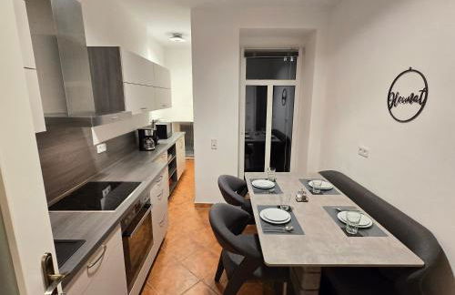 Boardinghouse mit 10 großen Apartments mit Parkplatz und Balkon - Photo 14