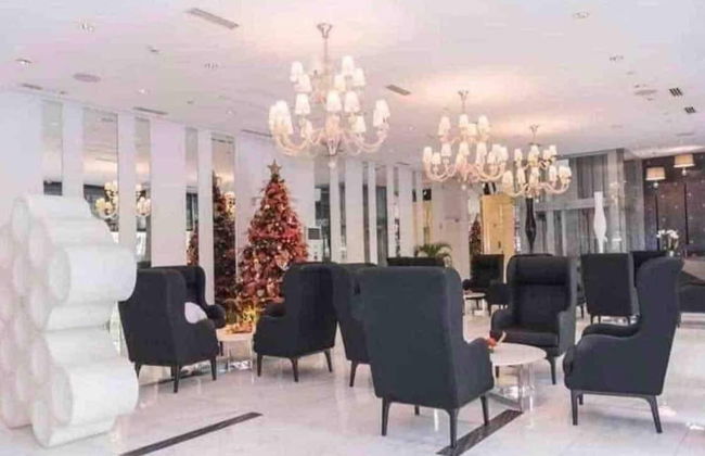 Cozy 1BR Cityview With Balcony and Near Airport - Photo 1