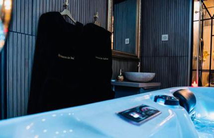 Loveroom 50 nuances de bulles jacuzzi et sauna privatif - Foto 5
