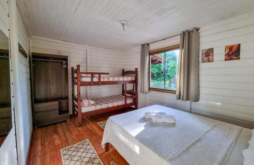 Casa 4 dorms 2 suites - localização perfeita no centrinho e rodeada de natureza - Foto 18