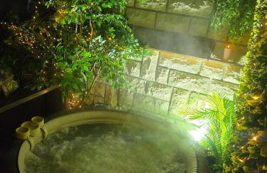 Love room avec spa privatif et salle de jeux adultes - Foto 14
