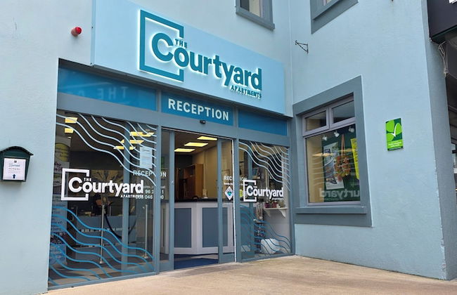 The Courtyard Apartments - Foto 1