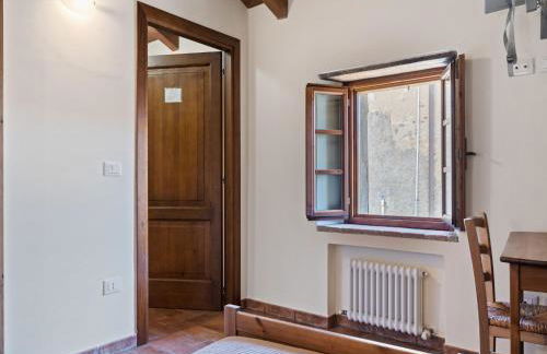 Tranquil Village Stay with Fireplace - Photo 18