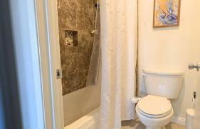 Poolside 2BR Condo with Balcony & Workspace - Photo 26