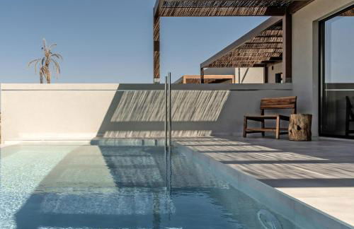 AKU Suites with private pools - Photo 26