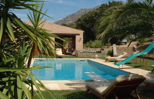 Villa A Scopa à Lumio en Corse avec piscine chauffée, vue mer panoramique, climatisation, jardin arboré de 3000m2, 10 pers, 5 Chb, 4 Sdb - Foto 26