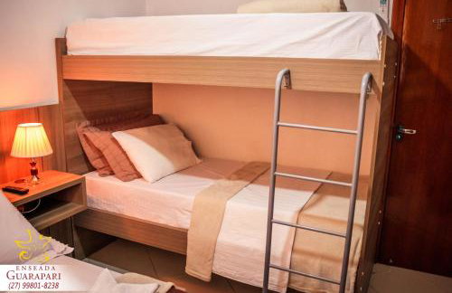 MAIOR NOTA - 2 Quartos com AR CONDICIONADOS SPLIT, Air Fryer, Wi-Fi, Disney Plus, Star Plus, HBO Max, Cadeiras de Praia, Caixa Térmica, Churrasqueira, Rede para Descanso e Chuveirão - 8 pessoas - CONFORTO Máximo - Melhor Localização!! - Photo 10