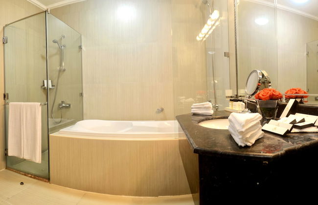 Magnum Hotel & Suites West Bay - Foto 13