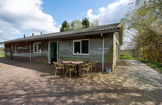 Holiday Home with Meadow View near Forests - Photo 1
