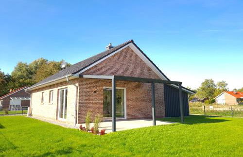 Haus KüstenBrise - Urlaub mit Hund an der Küste mit eigenen Garten, Sauna und gemütlichen Kaminfeuer - Foto 1