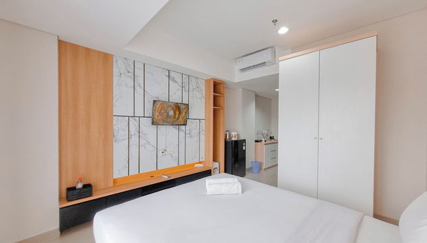 Homey And Relaxing Studio Patraland Amarta Apartment - Foto 2, Habitación