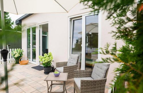 Modernes Ferienhäuschen am Zeulenrodaer Meer mit Terrasse, Klimaanlage, 1 SZ, max 3 Gäste - Photo 1