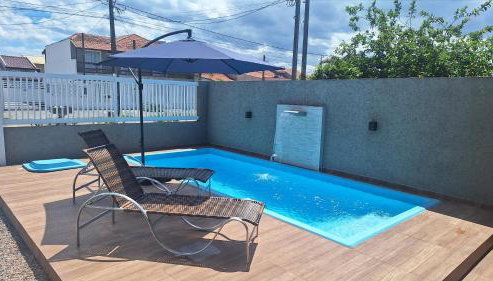 Mar Doce Lar Casa na praia de guaratuba com piscina e ar condicionado - Foto 4, sunbed