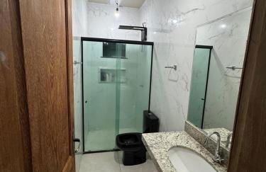 Casa com suítes e varandas com uma garagem - Foto 13