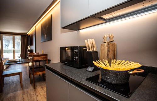 WHISPERING PINES LODGE Mountain view apartment with ski-in access - Foto 36