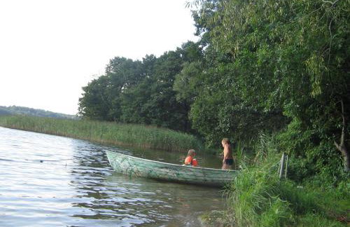 Dom z pięknymi widokami na jezioro ryńskie ilasy. - Foto 24