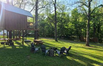 Tree House Glamping Destination near the Ozarks, with River Access for Swimming and Fishing - Photo 1