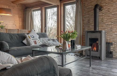 traumHaff Küstenchalets - einzigartige Chalets an der Ostsee. Ganz aus Lärchenholz mit Kamin und Sauna - Foto 8