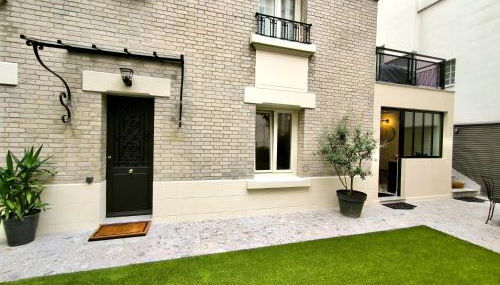 Montmartre en rez-de-jardin - Foto 2, Garden view