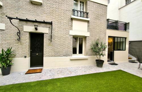 Montmartre en rez-de-jardin - Foto 2