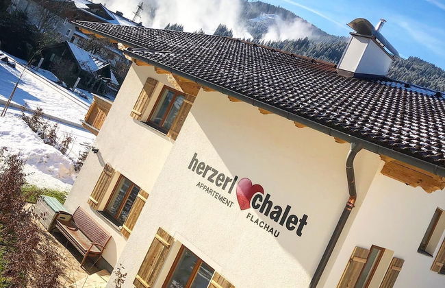 Herzerl-Chalet Appartements - Photo 8