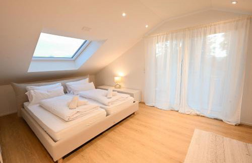 Liboria I Stylische Maisonette Wohnung Alpenblick I 4min zum See - Foto 36
